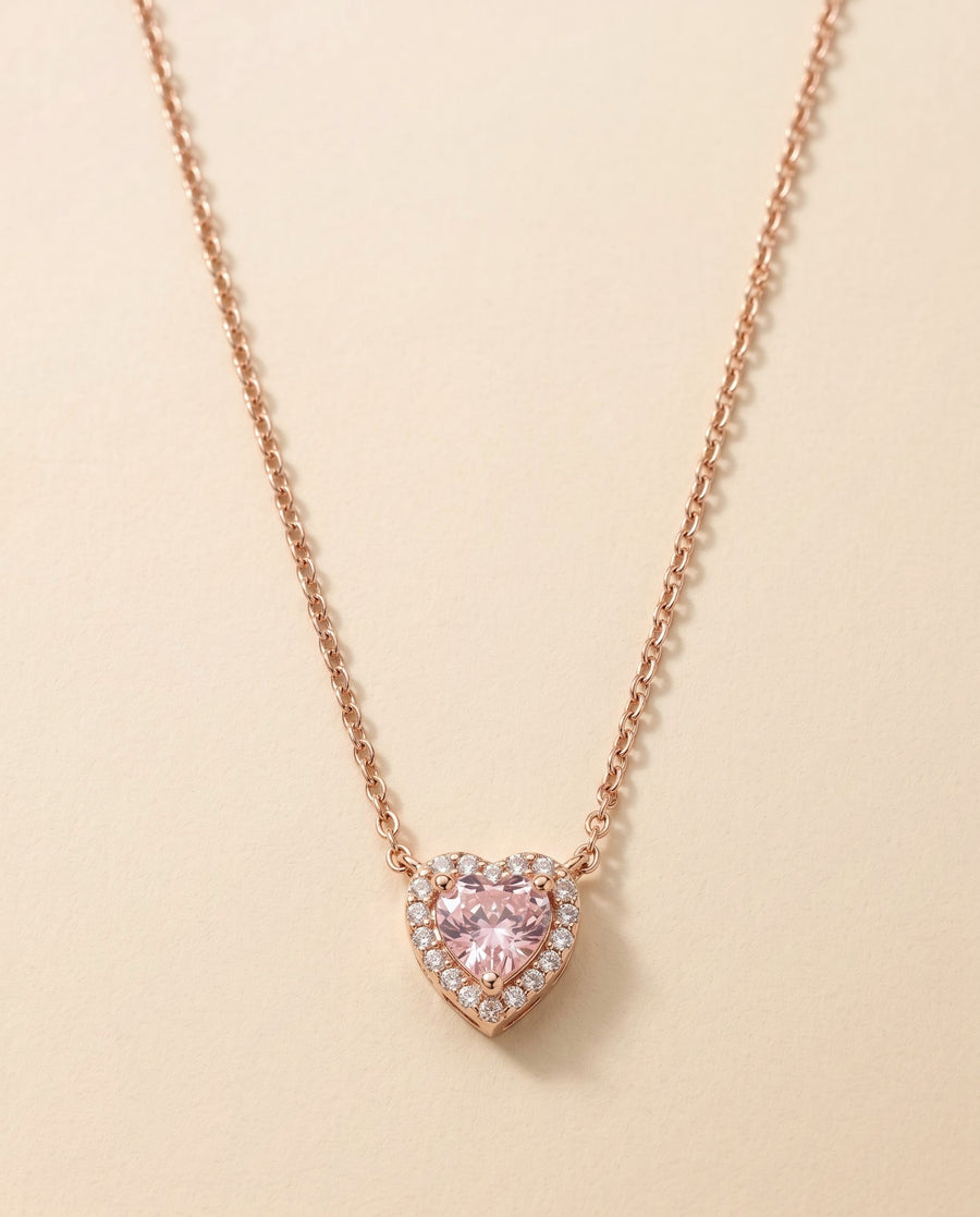 heart locket necklace, pink heart stone in a crystal halo, rose gold