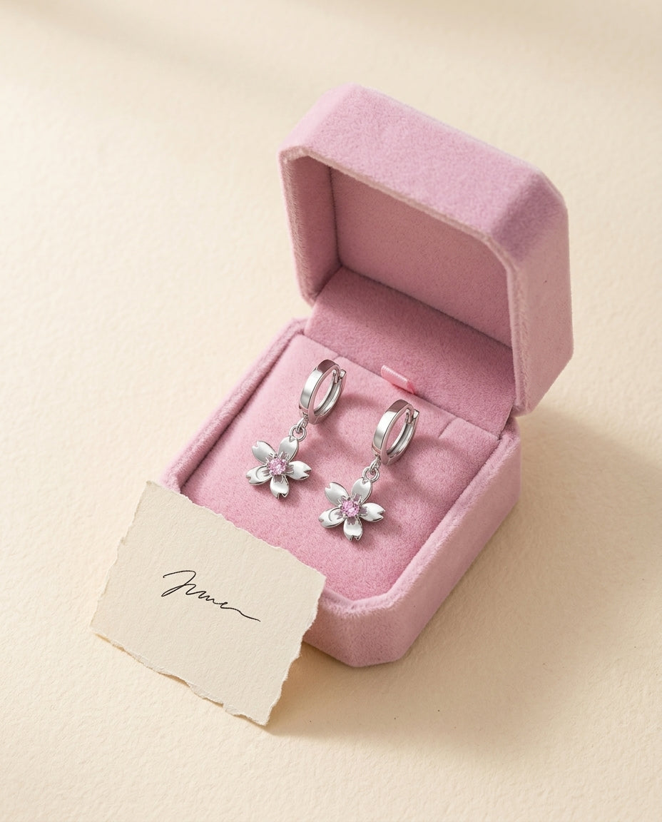 sakura drop hoops in a pink gift box with a note